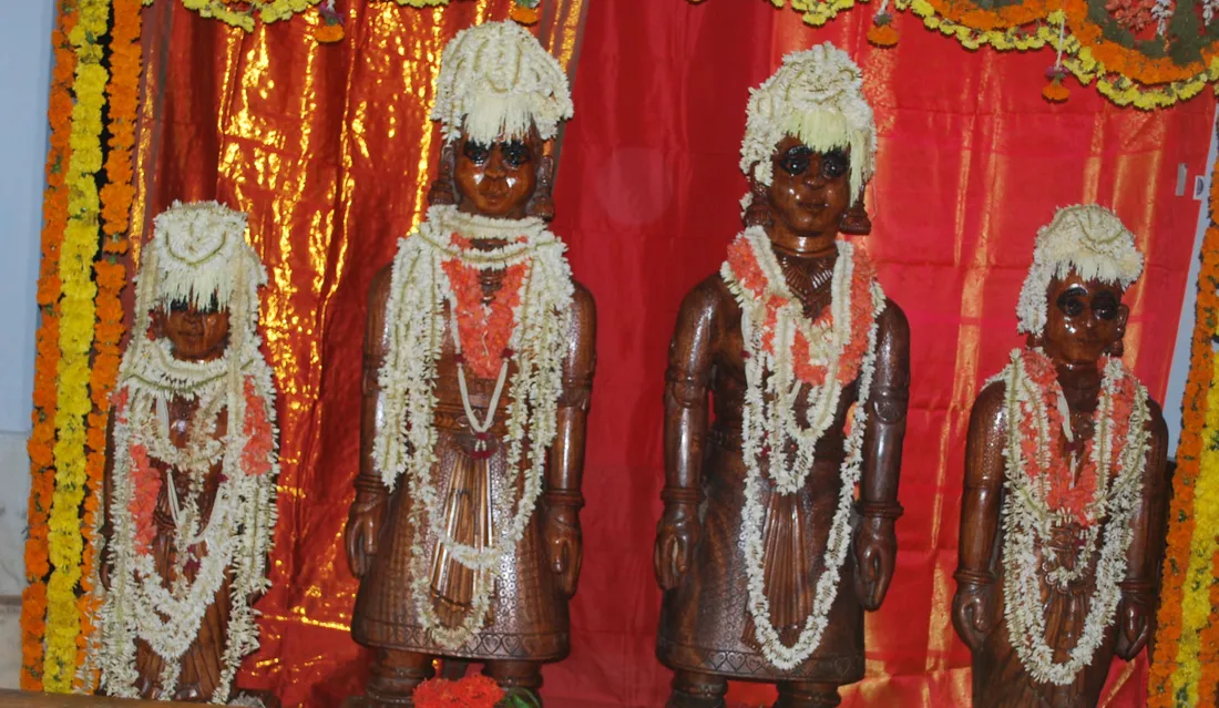 Garlanded carved wooden images honoured at the Siri festival at Kavattar near Kateel in coastal Karnataka, where Tuluva families gather on a full-moon night
