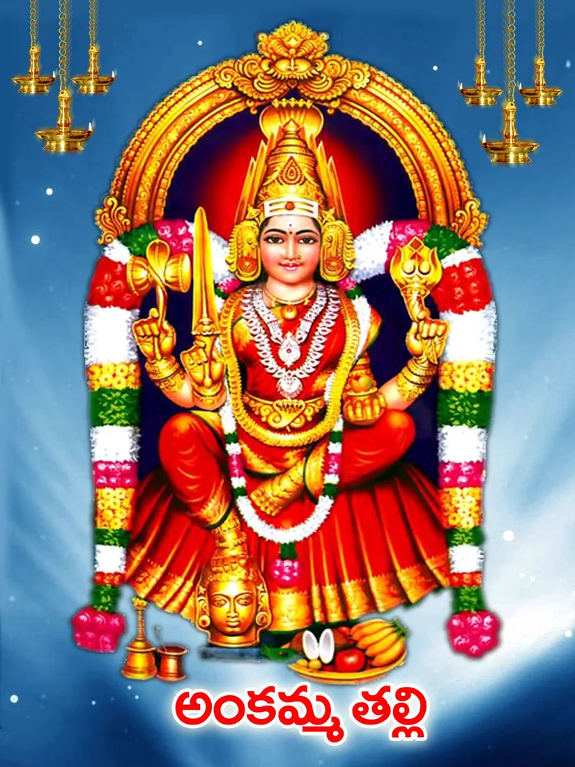 Ankamma Thalli, the goddess Mudiraj families keep as their own, seated in red and gold beneath hanging lamps with offerings set before her, her name written in Telugu