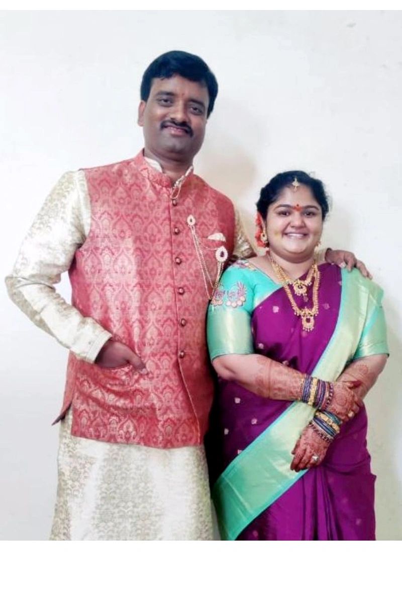 Srinidhi and Gowthami standing together in wedding attire